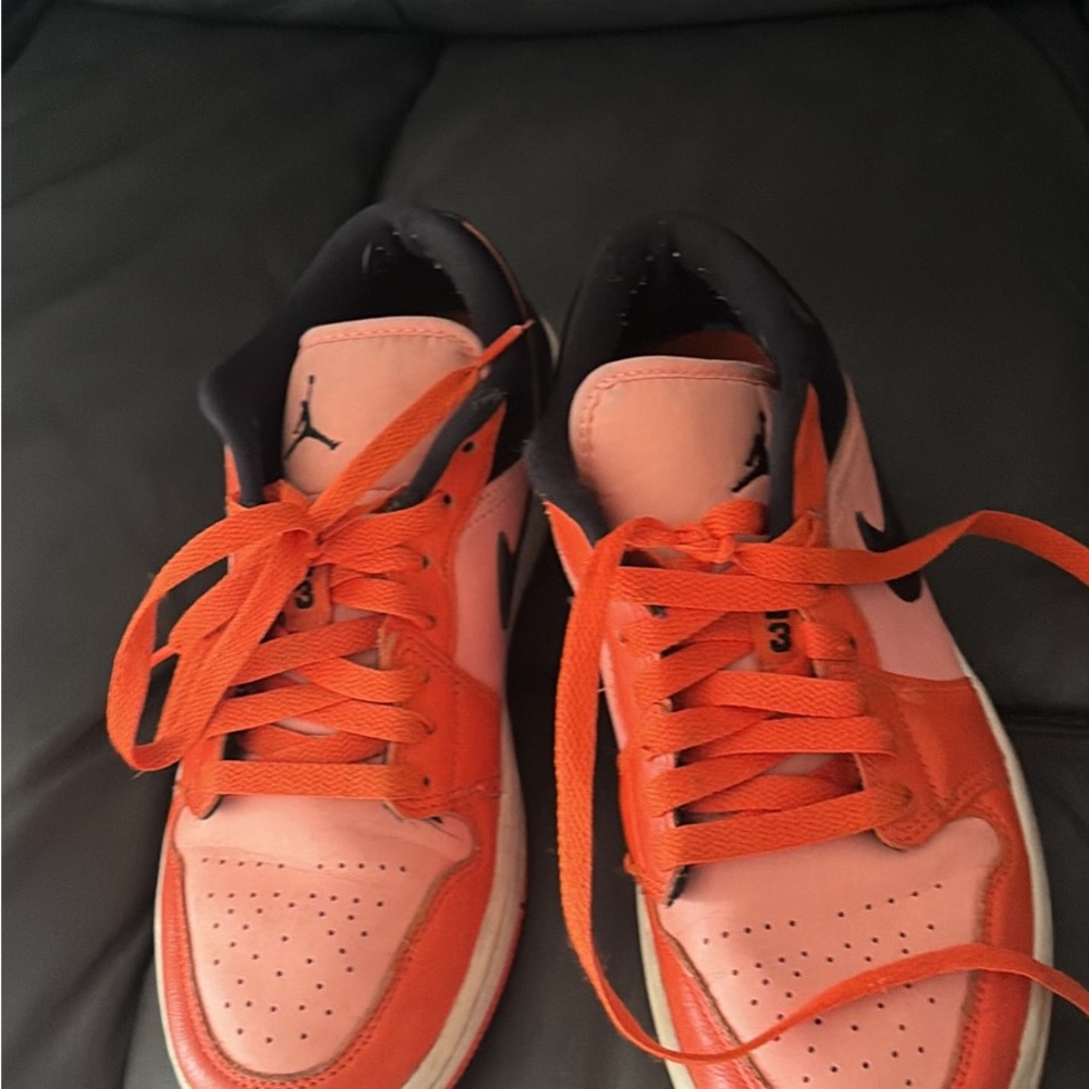 Air Jordan Orange and black sneakers